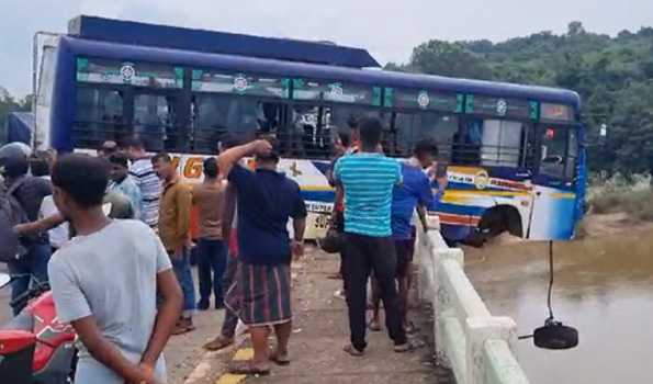 Providential escapes for passengers as Bus  hangs on a bridge over Mahanadi river