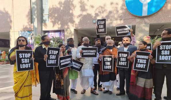 TMC stages protest over Adani issue