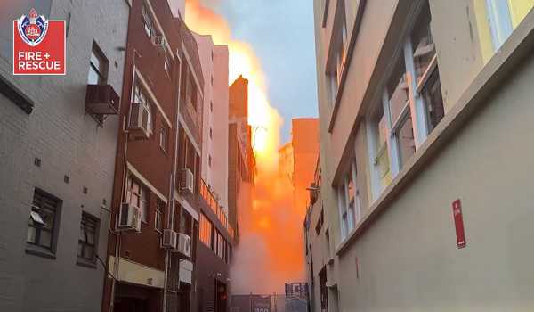 Two teenagers hand themselves in over major fire guts buildings in central Sydney