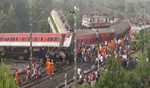 Servitors lit Diya for salvation of people died and speedy recovery of passengers injured in Balasore