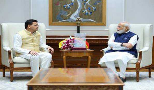 धामी ने दिया मोदी को निवेशक सम्मेलन के लिए आमंत्रण