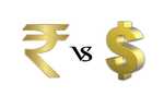 Rupee slips paise against  USD