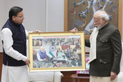 NEW DELHI, DEC 2 (UNI):- Prime Minister Narendra Modi during a meeting with Uttarakhand Chief Minister Pushkar Singh Dhami, in New Delhi on Saturday. UNI PHOTO-115U NEW DELHI, DEC 2 (UNI):- Prime Minister Narendra Modi during a meeting with Uttarakhand Chief Minister Pushkar Singh Dhami, in New Delhi on Saturday. UNI PHOTO-115U