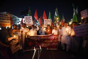PATNA, JUNE 3 (UNI):- Communist Party of India (Marxist-Leninist) National Secretary Dipankar Bhattacharya with Grand Alliance leaders participating at a candles light procession to pay tribute to people killed in the Odisha train accident, and to support protesting wrestlers, in Patna on Saturday. UNI PHOTO-AKX3U