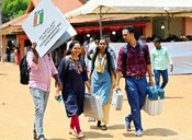 PALAKKAD, APR 25 (UNI):- Polling officials team on the way to their respective polling booths by carrying the EVMS and elections materials to conduct the second phase of Lok Sabha polls scheduled on April 26 from the distribution center at Vyasa Vidhya Peedom in Kongad, on Thursday. UNI PHOTO-109U