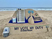 PURI, APR 25 (UNI):- On the occasion of second phase of voting sand artist Sudarsan Pattnaik created a sand sculpture with the message 'My Vote My Duty', at Puri beach in Odisha on Thursday. UNI PHOTO-123U